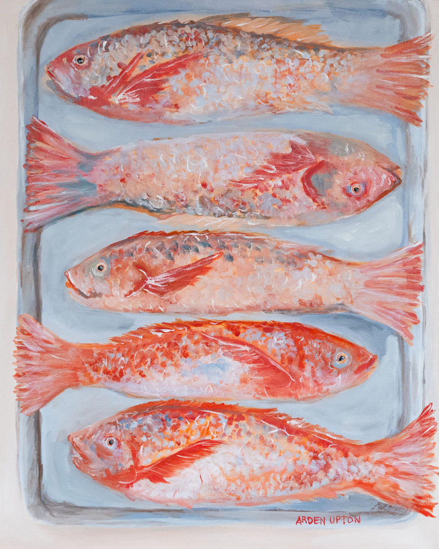 An up close of the original oil painting of 5 beautiful red fish with dimension sof color on their scales lying on a silver baking pan. The best food art for your kitchen , dining room or breakfast nook. Great for a gallery wall paired with other pieces from the Frank's Table Collection