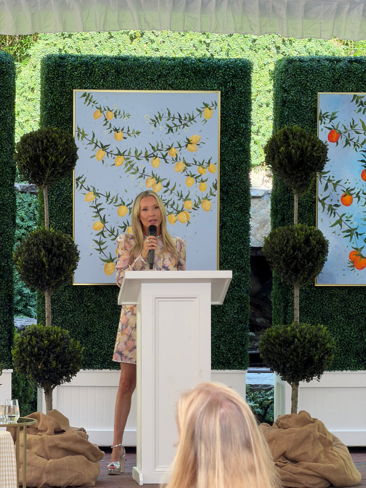 Original Painting by Southern Artist Arden Upton of Lemon tree branches bursting with lemons and green leaves on a light blue background hung on a boxwood wall at a luncheon for interior decorators. Would also be perfect for kitchens, dining areas, and other places in your home. 