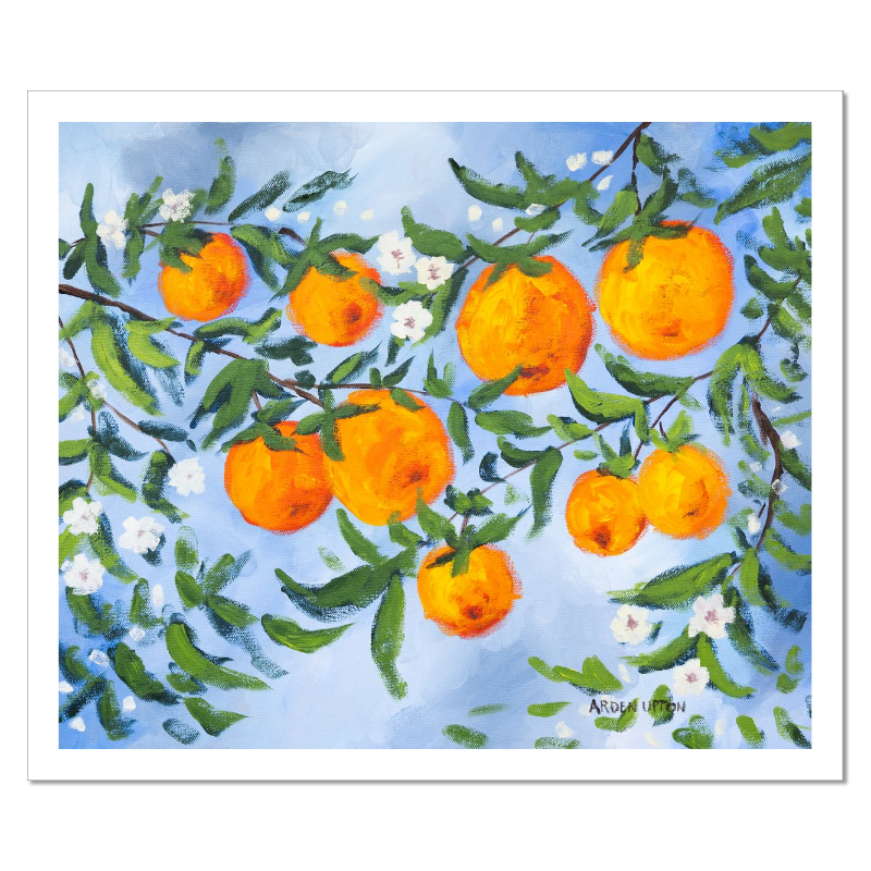 A ready to hang, framed giclee art print featuring a painting of oranges on a tree with white flowers and a blue sky background by Arden Upton from her Orangerie Collection. Art for Gallery walls, kitchens, bright and happy spaces
