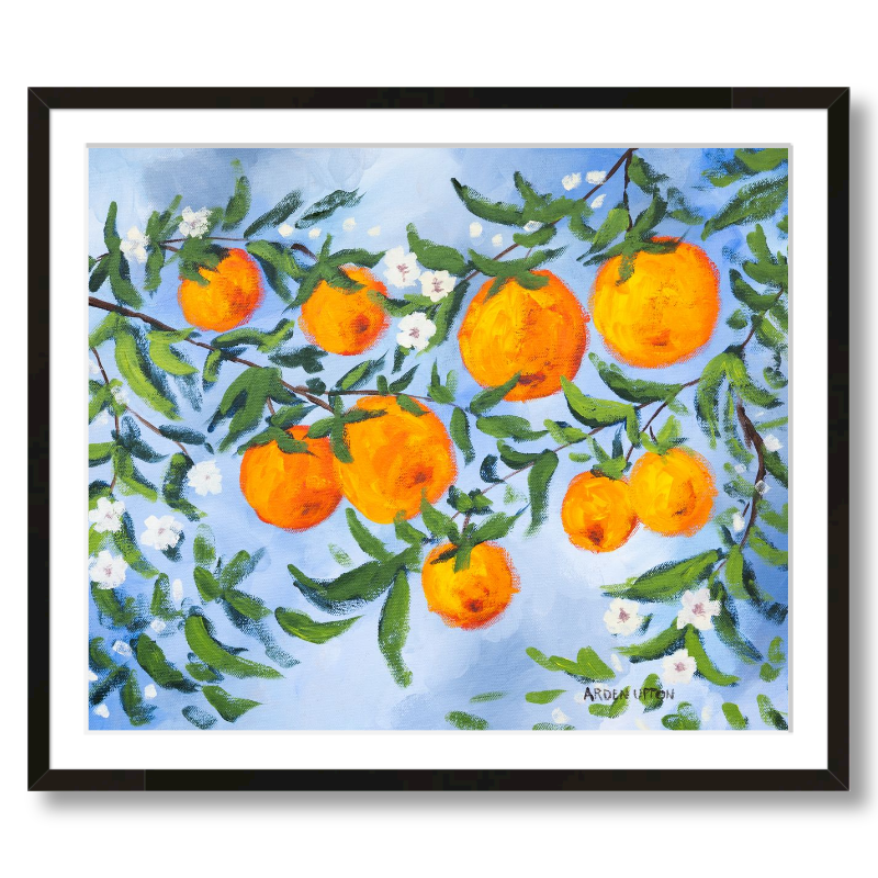 A ready to hang, framed giclee art print featuring a painting of oranges on a tree with white flowers and a blue sky background by Arden Upton from her Orangerie Collection. Art for Gallery walls, kitchens, bright and happy spaces