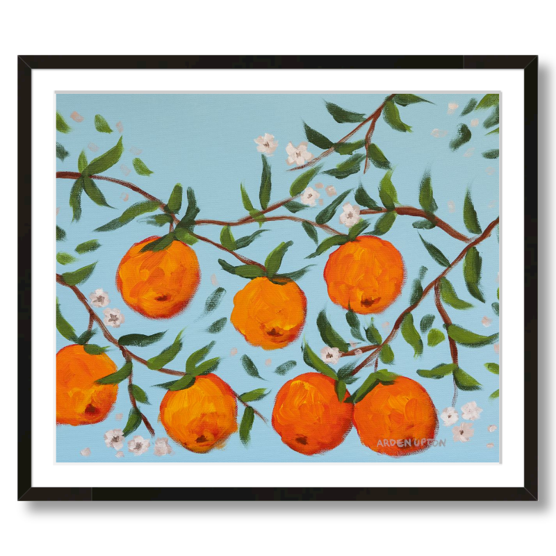 A ready to hang, framed giclee art print featuring a painting of oranges on a tree with white flowers and a blue sky background by Arden Upton from her Orangerie Collection. Art for Gallery walls, kitchens, bright and happy spaces