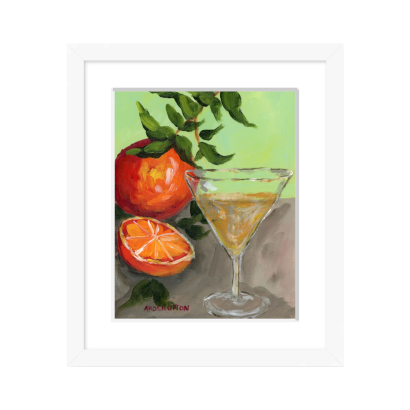 Food-inspired painting of beautiful Oranges and a Martini  in bold oranges and red with an orange tree stem on a grey table with a lime green background, framed in a white frame great  for kitchens and dining room gallery walls