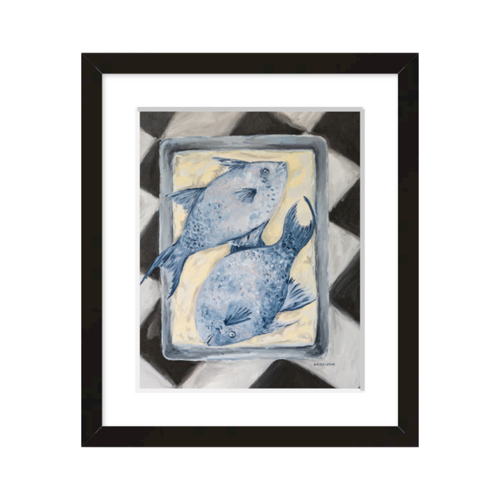 Coastal-inspired Blue Fish painting framed in black – two blue fish on a tray sitting on a black and white checkered surface. A fine art print from the Frank’s Table collection, perfect for dining room or kitchen décor