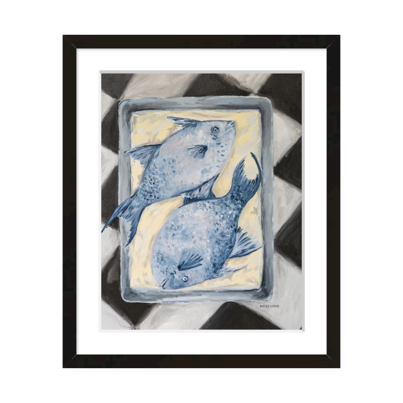 Coastal-inspired Blue Fish painting framed in black – two blue fish on a tray sitting on a black and white checkered surface. A fine art print from the Frank’s Table collection, perfect for dining room or kitchen décor