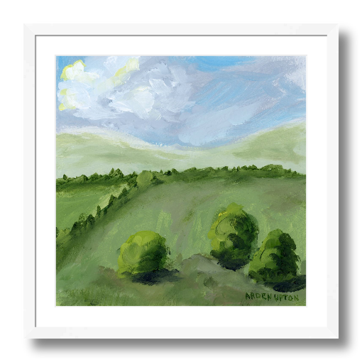 A framed, ready to hang giclee print of green trees and rolling hills with blue sky and white clouds. From an original painting from Arden Upton's Blue Skies Collection. Great for decorating your living room, bedroom and hallway walls in your home