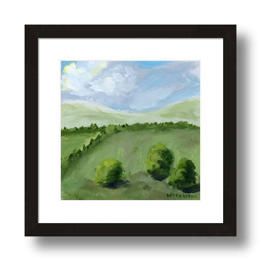 A framed, ready to hang giclee print of green trees and rolling hills with blue sky and white clouds. From an original painting from Arden Upton's Blue Skies Collection. Great for decorating your living room, bedroom and hallway walls in your home