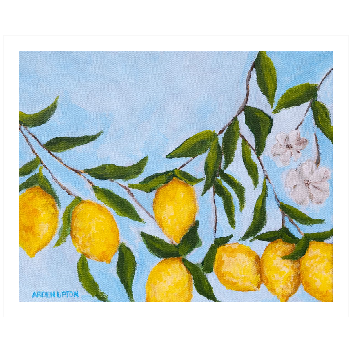 A framed art print featuring a painting from Arden Upton's Lemonade Collection of lemons , leaves and white floral elements against a blue background, with a white mat and black frame.