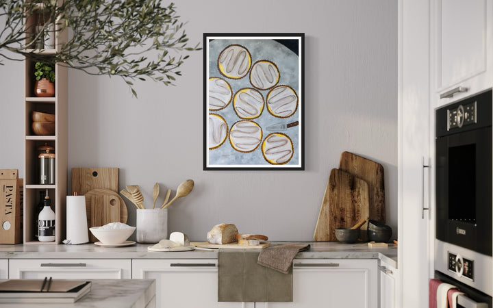 Painting of eight lemon tarts on a table with a tart server hung in a kitchen with many kitchen utensils on the countertop