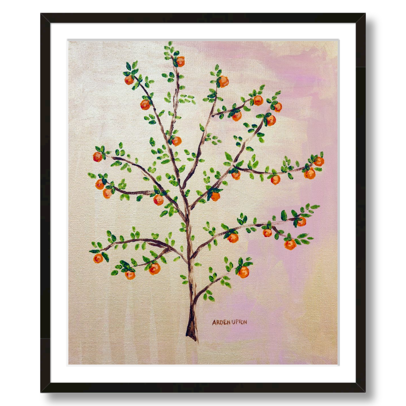 A framed, ready to hang giclee print of an orange tree with green leaves and ripe oranges on a pink and yellow background. An original painting from Arden Upton's Orangerie Collection. Great for decorating walls in kitchens and bright spaces. Buy one or multiple from the collection