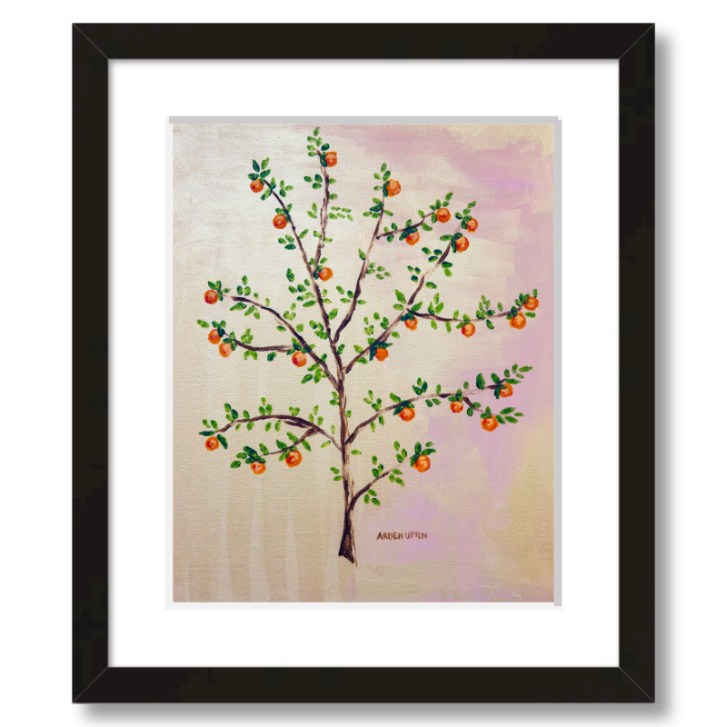 A framed, ready to hang giclee print of an orange tree with green leaves and ripe oranges on a pink and yellow background. An original painting from Arden Upton's Orangerie Collection. Great for decorating walls in kitchens and bright spaces. Buy one or multiple from the collection