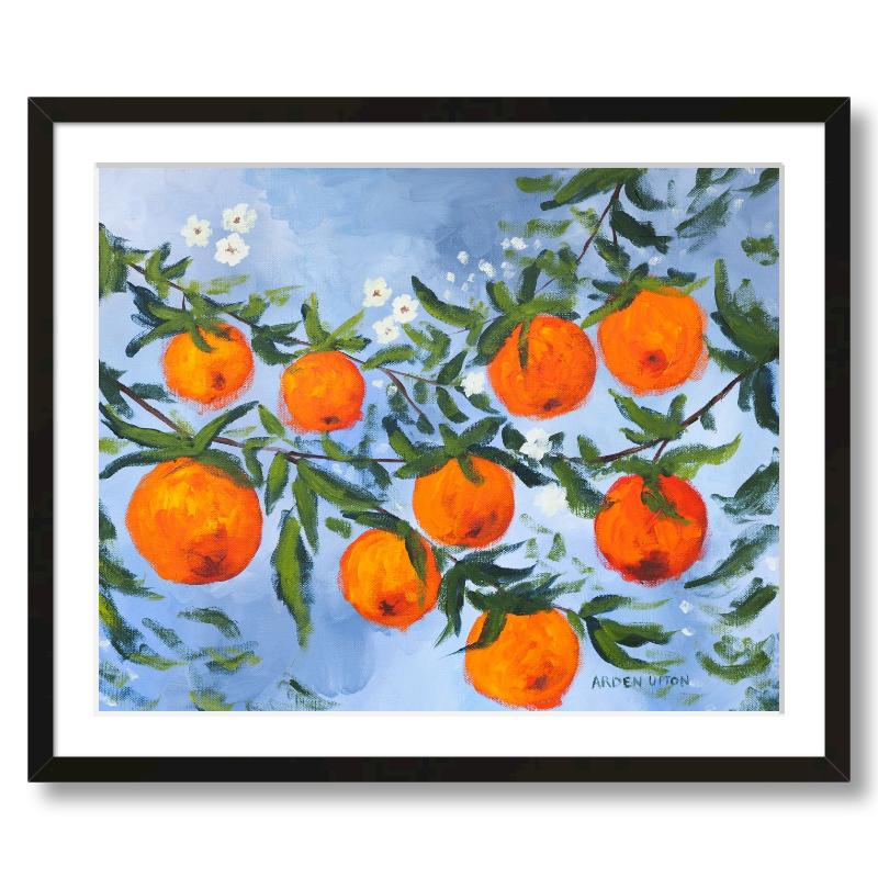 A ready to hang, framed giclee art print featuring a painting of oranges on a tree with white flowers and a blue sky background by Arden Upton from her Orangerie Collection. Art for Gallery walls, kitchens, bright and happy spaces
