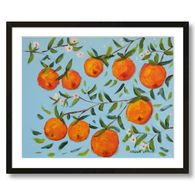 A ready to hang, framed giclee art print featuring a painting of oranges on a tree with white flowers and a blue sky background by Arden Upton from her Orangerie Collection. Art for Gallery walls, kitchens, bright and happy spaces