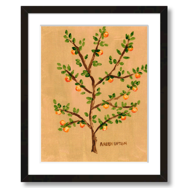 A framed giclee art print of an orange tree with green leaves and orange fruits on a beige and golden background. A vibrant orange painting by ARDEN UPTON from her Orangerie Collection, ideal for gifting or brightening up any space.