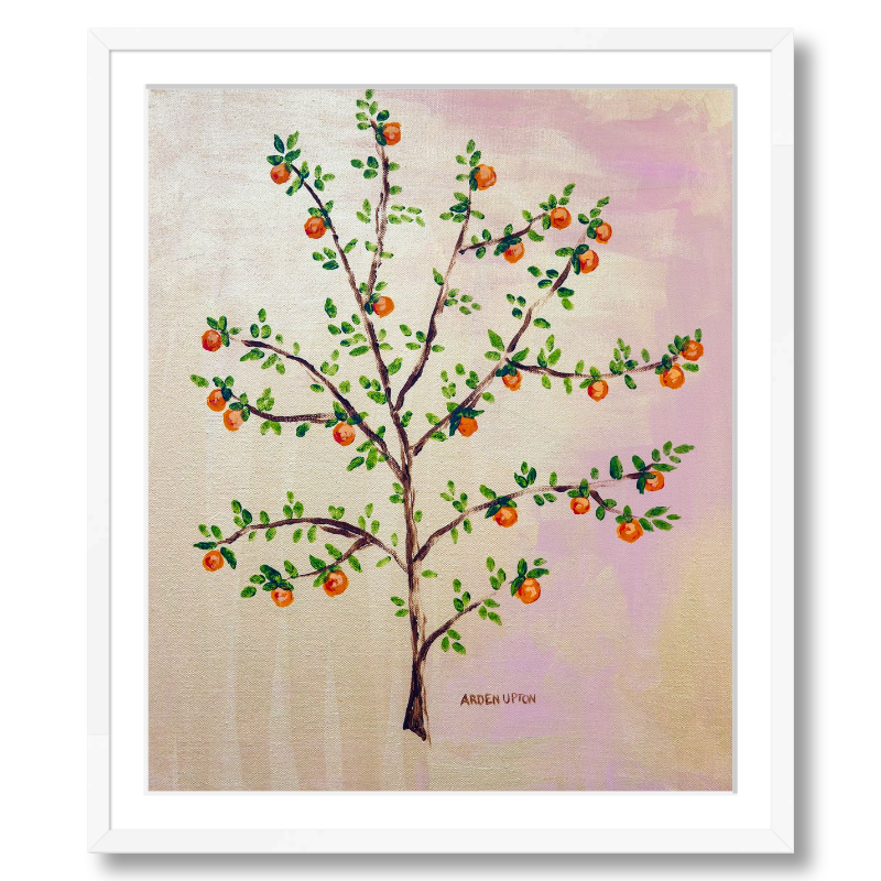 A framed, ready to hang giclee print of an orange tree with green leaves and ripe oranges on a pink and yellow background. An original painting from Arden Upton's Orangerie Collection. Great for decorating walls in kitchens and bright spaces. Buy one or multiple from the collection