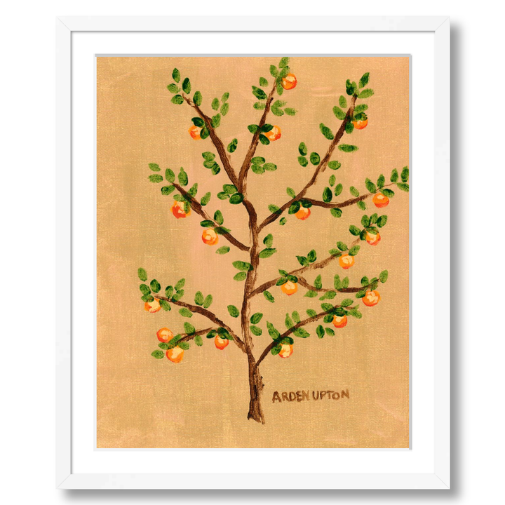 A framed artwork of an orange tree with green leaves and orange fruits on a beige background, signed by Arden Ward Upton.