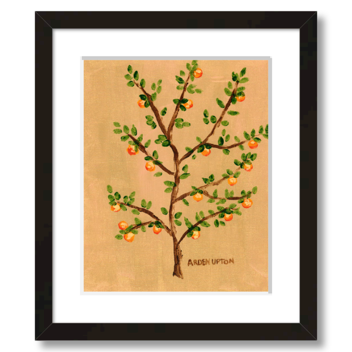 A framed giclee art print of an orange tree with green leaves and orange fruits on a beige and golden background. A vibrant painting by Arden Upton from her Orangerie Collection, ideal for gifting or brightening up any space.