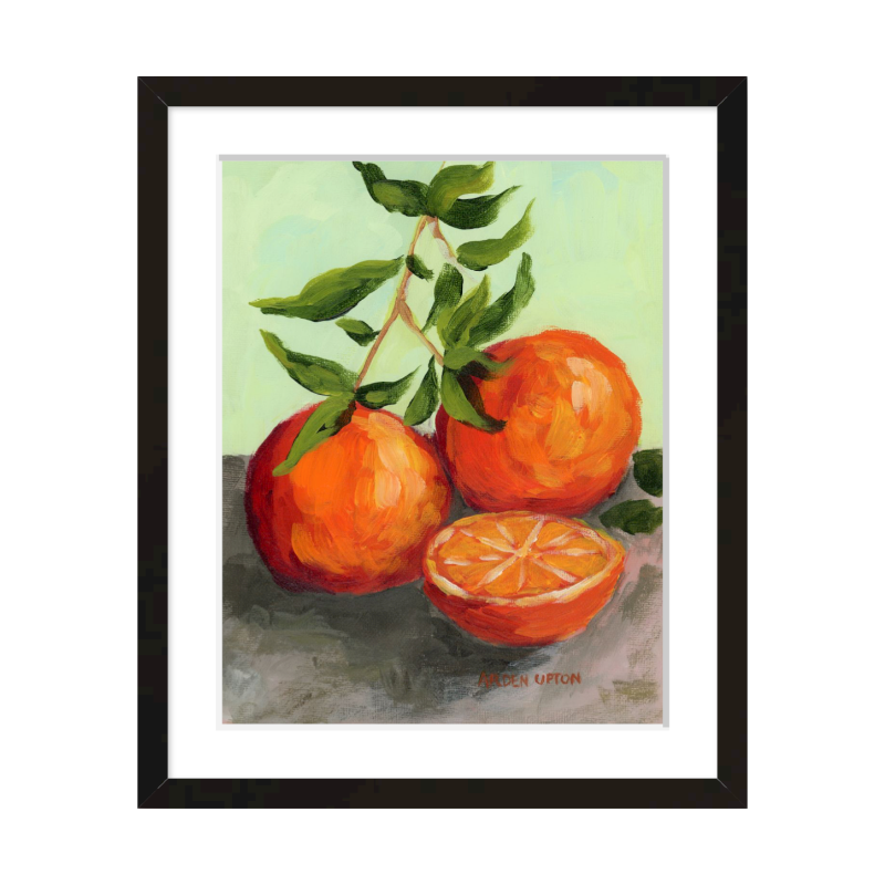 Gallery wall in dining room – Southern artist Arden Upton’s citrus paintings in orange, red with green leaves on a lime green background. These prints are easy hang art framed for stylish dining décor