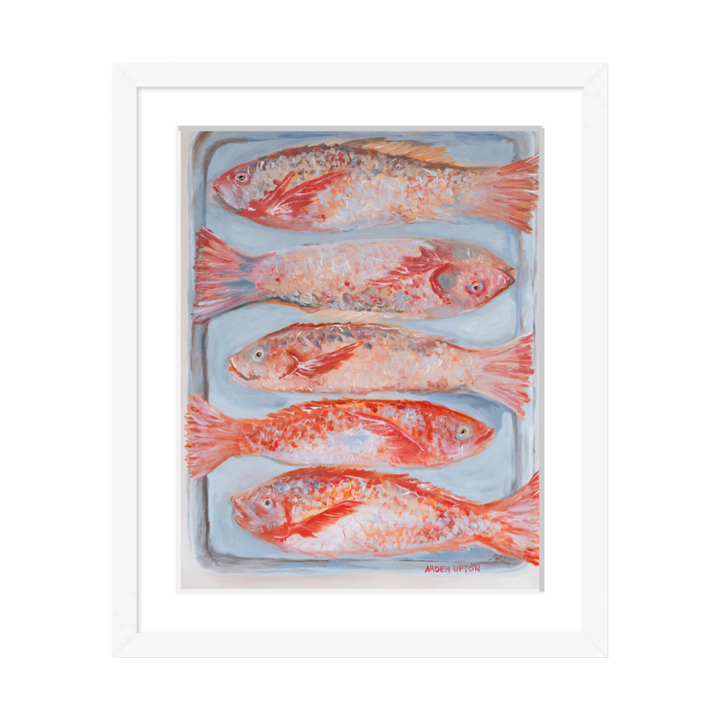 A beautiful painting of 5 red fish on a silver pan. Vibrant reds, oranges and pinks. Framed in a white frame