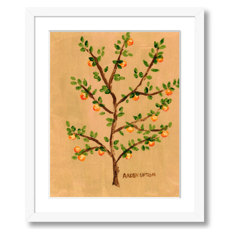 A framed giclee art print of an orange tree with green leaves and orange fruits on a beige and golden background, signed by Arden Ward Upton. Vibrant orange artwork from the Orangerie Collection, ideal for gifting or brightening up any space.